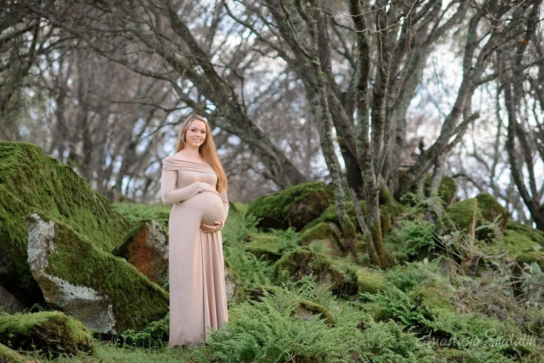 Maternity portrait among woodland and ferns
